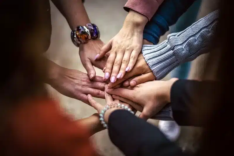 women holding hands