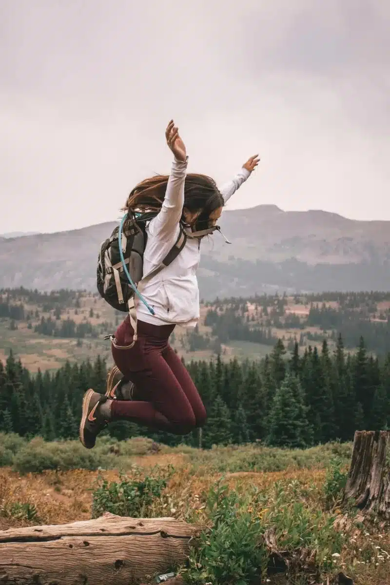 image of a happy woman for a blog article on happy and peaceful life